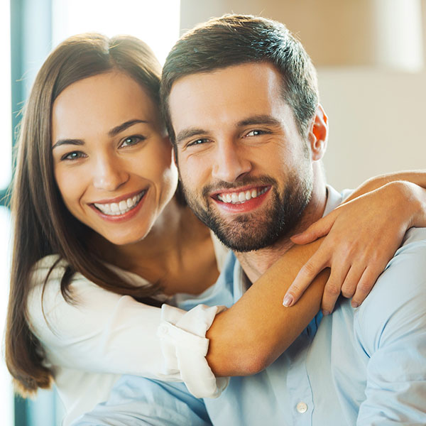 couple hugging and smiling