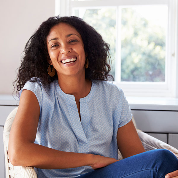 happy woman in chair