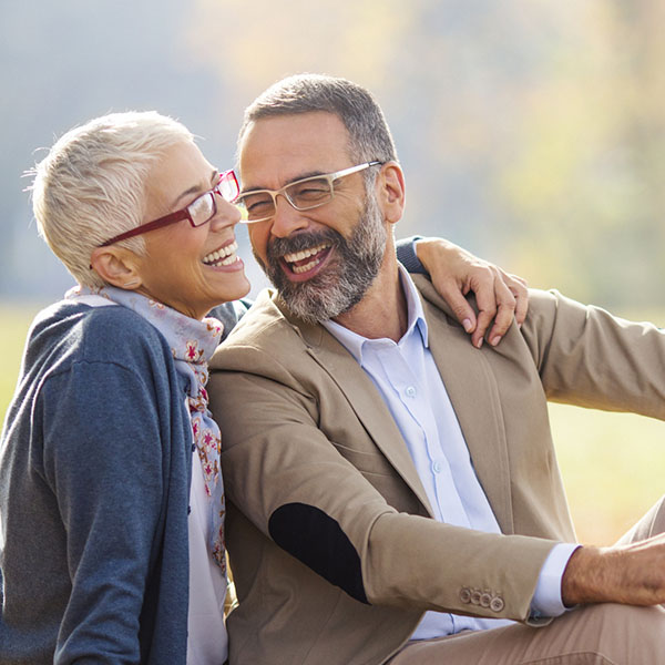 elderly couple smiling